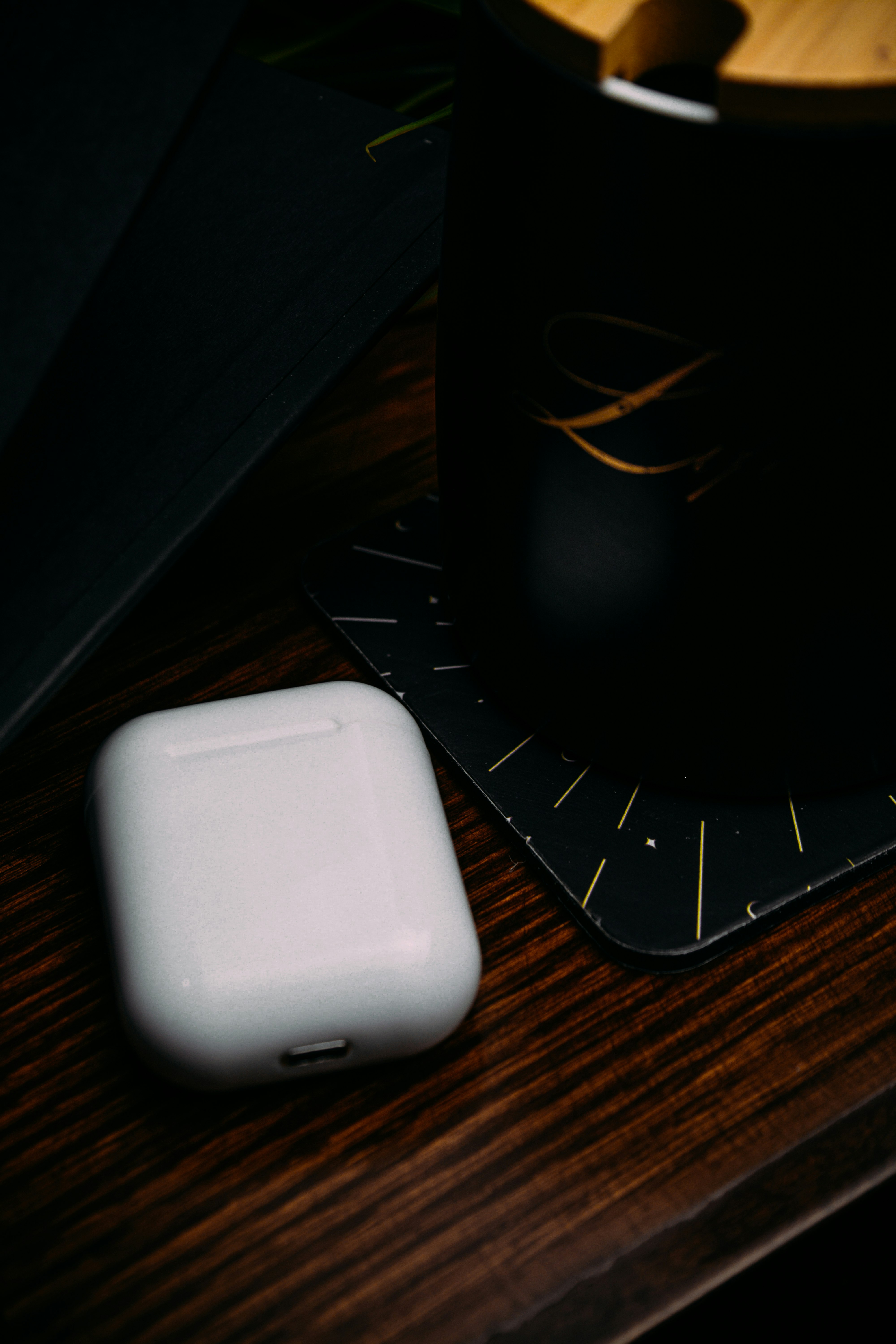 white apple airpods charging case